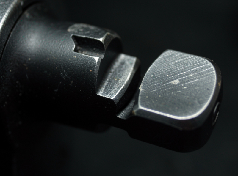 Macro view of throttle quadrant lever detents showing light finger wear after a year of use